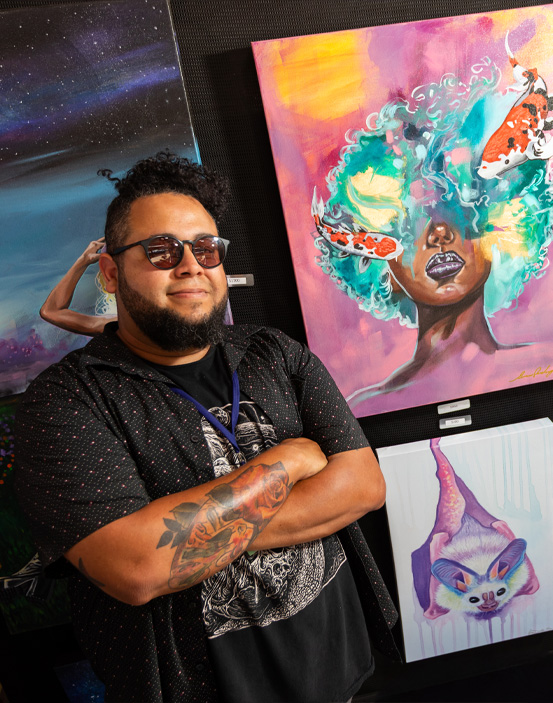 Man juggling flaming torches.